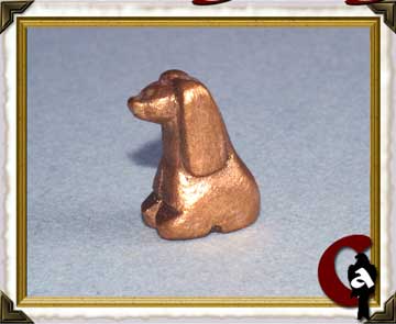 Miniature - sitting dog